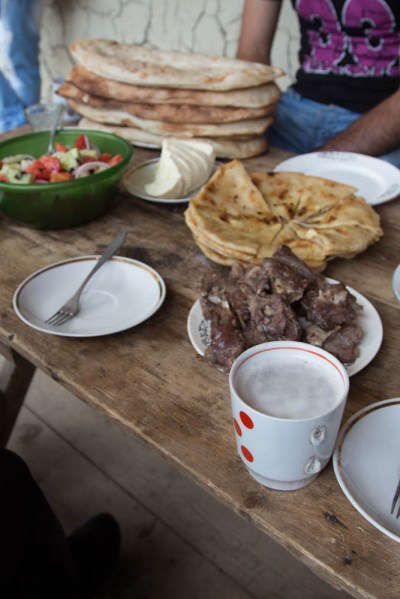 An impromptu lunch offer from Alika, who gave us a lift from Omalo to Dartlo. The pizza-looking dish is Khachapuri, a typical Georgian cheese bread. After lunch we and his family piled into his Hilux for the ride to Omalo. They were moving back to Kakheti for the long Tushetian winter.