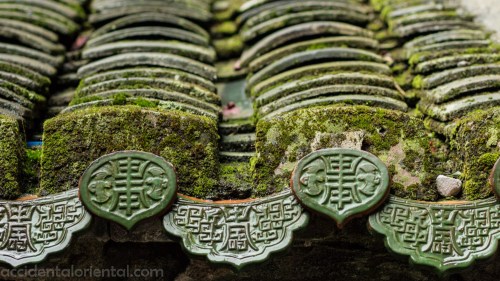 Ornate eave decorations in the Yanxianglou building near Yongding.